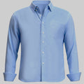 Standalone view of light blue Oxford button-down shirt with rolled sleeves for a smart-casual look.