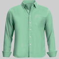 Standalone view of light green Oxford button-down shirt with rolled sleeves for a smart-casual look.