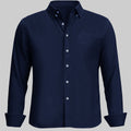 Standalone view of navy blue Oxford button-down shirt with rolled sleeves for a smart-casual look.