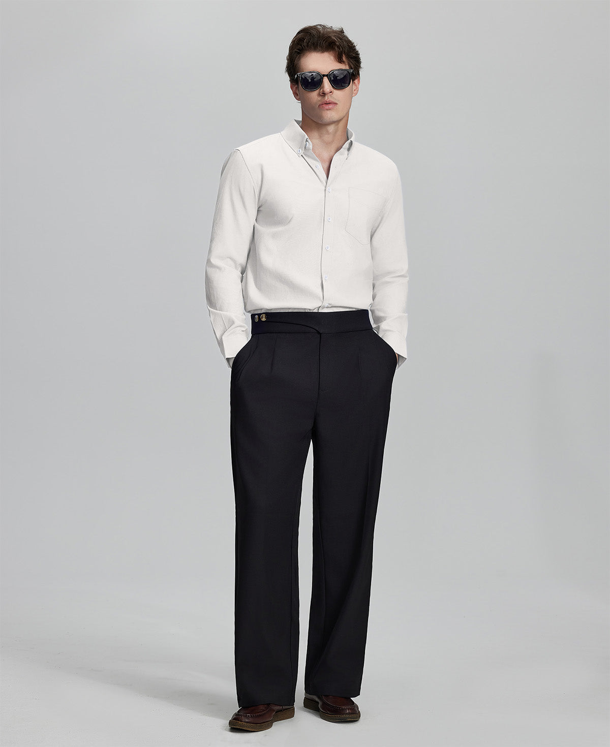 Full outfit: white Oxford shirt, wide-leg dress pants & brown shoes, minimalist yet polished style.