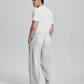 Back view of Men's Fleece Sweatpants ¨C relaxed drape and functional pockets enhance lounge-ready style.