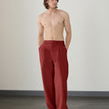 Wide leg silhouette of red Men's Pleated Baggy Dress Pants comfortable fit with relaxed drape.