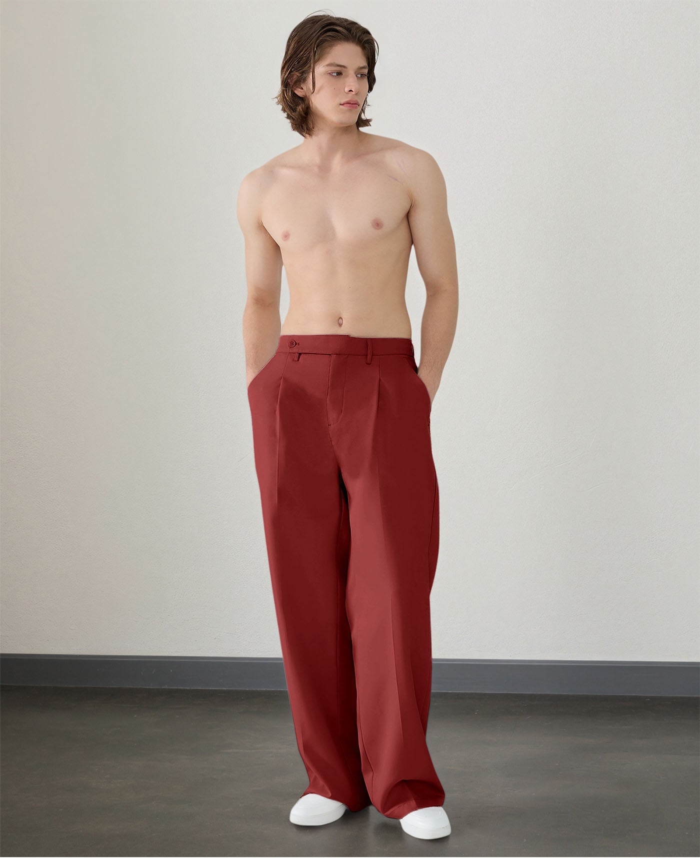 Wide leg silhouette of red Men's Pleated Baggy Dress Pants comfortable fit with relaxed drape.