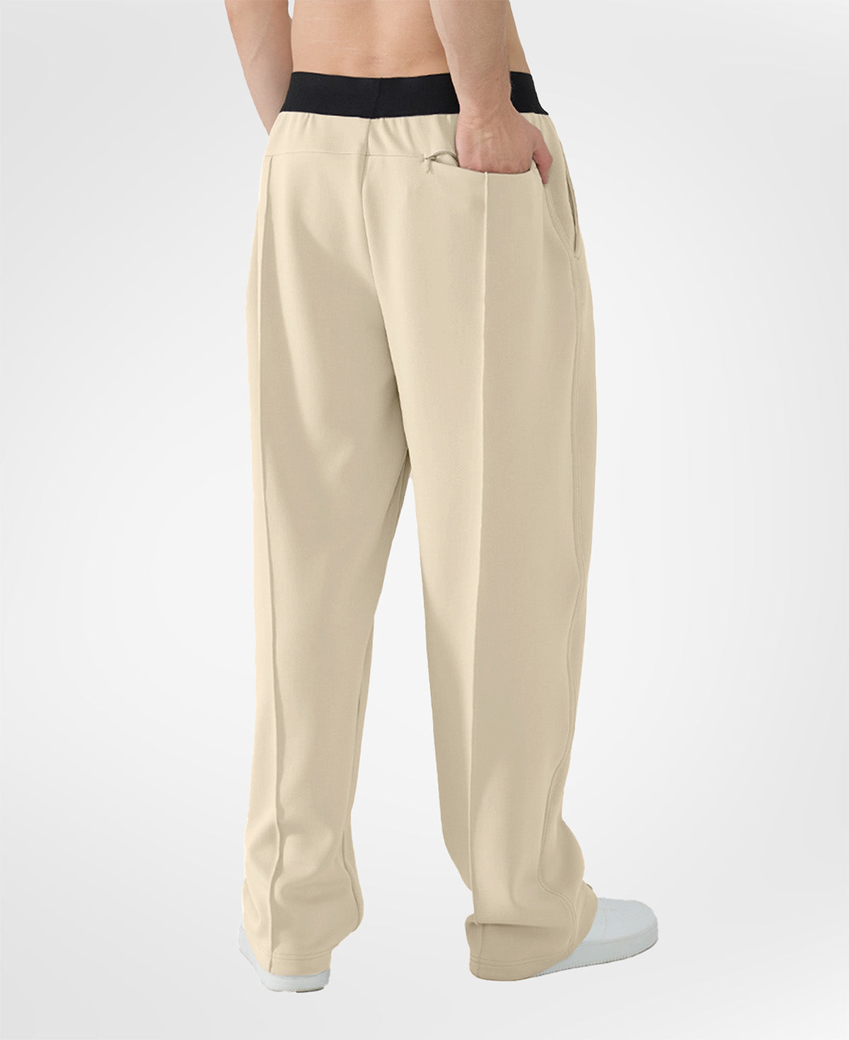 Back view of khaki pants showing rear pocket and overall silhouette, man with hand in back pocket for storage detail.
