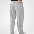 Back view of light grey pants showing rear pocket and overall silhouette, man with hand in back pocket for storage detail.