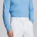 Close-up of waistband on Mens Pleated Dress Pants, highlighting button closure and tailored pleats for a refined look.