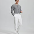 Model in white blazer, light blue shirt, and Mens Pleated Dress Pants showing smart business casual outfit with regular fit trousers.
