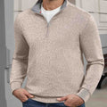 Indoor setting: model wearing apricot Men's Quarter Zip Sweater, highlighting practical quarter-zip design for casual wear.