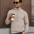 Model holding coffee in apricot Men's Quarter Zip Sweater, comfortable look for light casual settings.