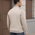 Back view of apricot Men's Quarter Zip Sweater showing smooth drape and minimalist silhouette.