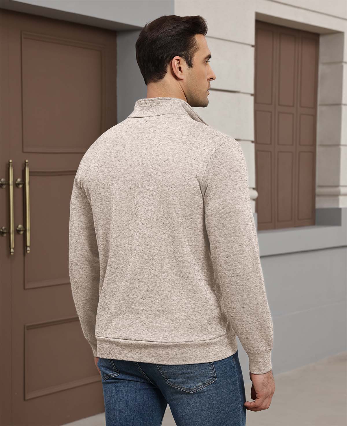 Back view of apricot Men's Quarter Zip Sweater showing smooth drape and minimalist silhouette.