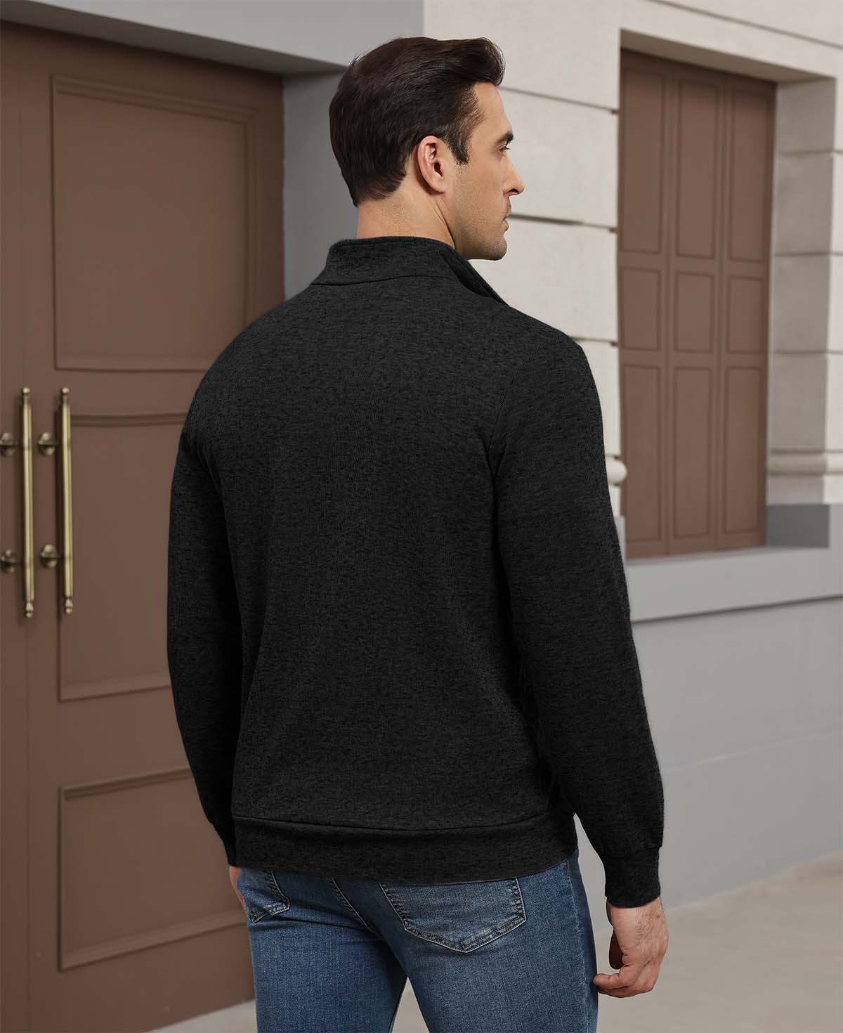 Back view of black Men's Quarter Zip Sweater showing smooth drape and minimalist silhouette.