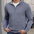 Indoor setting: model wearing navy blue Men's Quarter Zip Sweater, highlighting practical quarter-zip design for casual wear.
