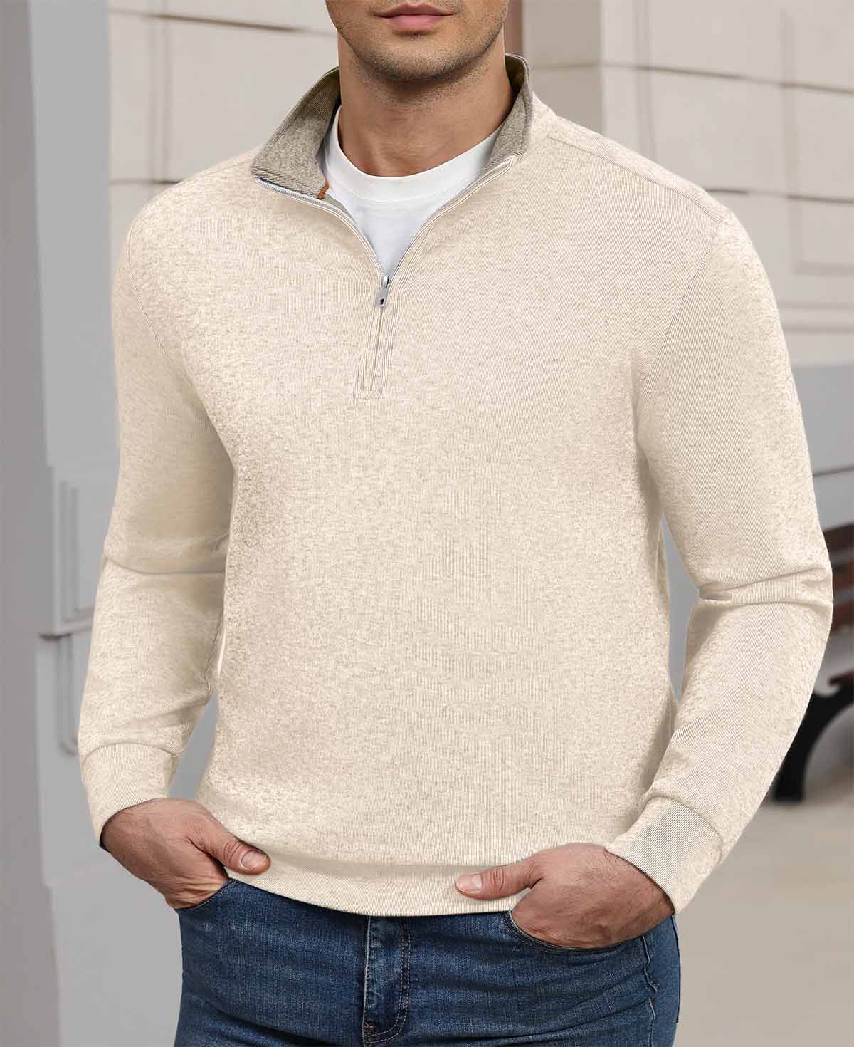 Indoor setting: model wearing white Men's Quarter Zip Sweater, highlighting practical quarter-zip design for casual wear.
