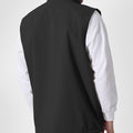 Back view of black Men's Softshell Vest ¨C clean, streamlined silhouette with minimalist design and flexible fit.