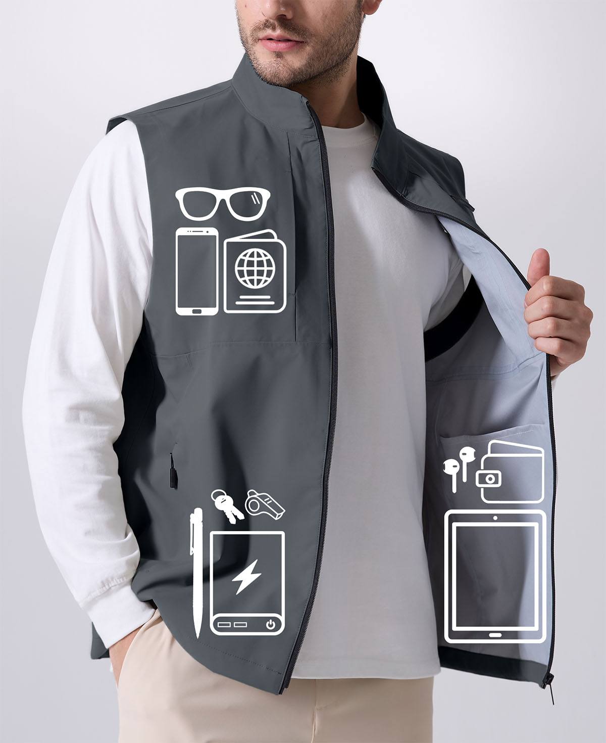 Pockets on dark grey Men's Softshell Vest hold phone, sunglasses, ID, practical storage for daily or outdoor use.