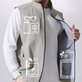 Pockets on sage green Men's Softshell Vest hold phone, sunglasses, ID, practical storage for daily or outdoor use.