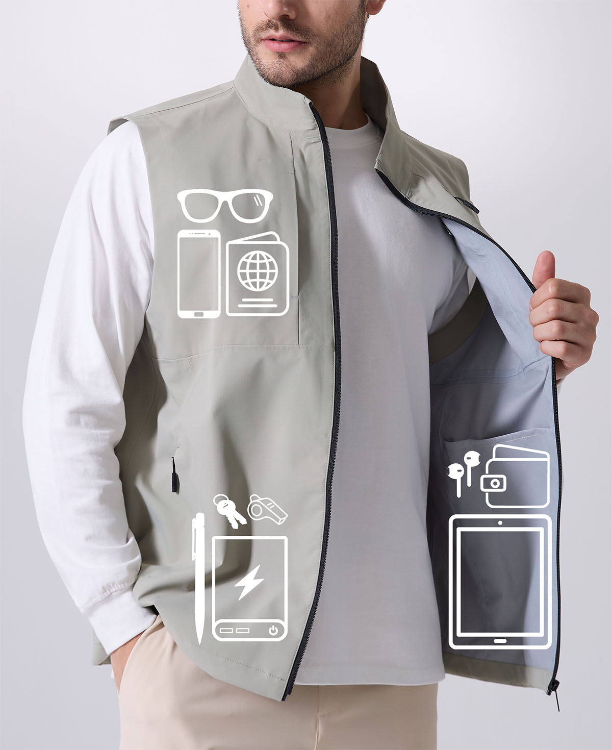 Pockets on sage green Men's Softshell Vest hold phone, sunglasses, ID, practical storage for daily or outdoor use.