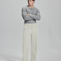 Model in gray sweater with apricot wide-leg corduroy pants, showcasing casual yet neat daily wear styling.