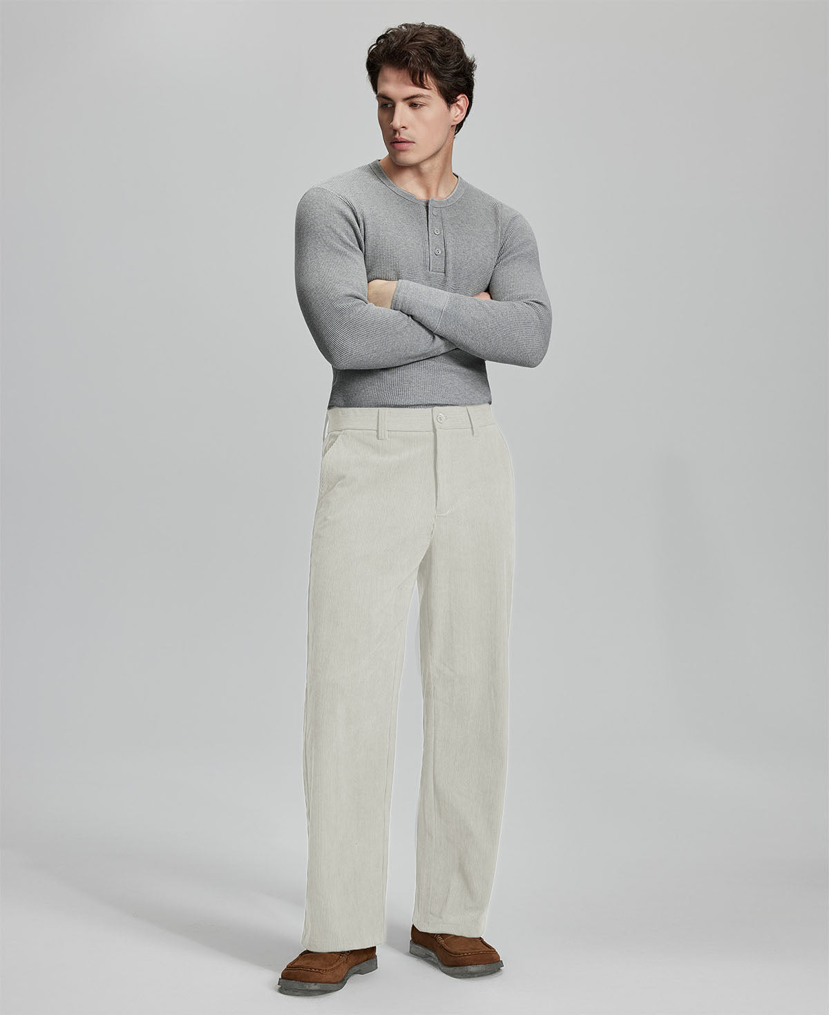Model in gray sweater with apricot wide-leg corduroy pants, showcasing casual yet neat daily wear styling.
