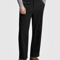 Man in gray knit, black Men's Wide Leg Corduroy Dress Casual Pants, and brown loafers, showing texture and drape.