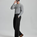 Side view of model wearing sunglasses with black wide-leg corduroy pants, highlighting loose fit and style adaptability.