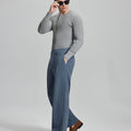 Side view of model wearing sunglasses with blue wide-leg corduroy pants, highlighting loose fit and style adaptability.