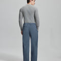 Back view of blue wide-leg corduroy pants, showing overall silhouette and rear pocket design for comfort and style.