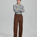 Model in gray sweater with coffee wide-leg corduroy pants, showcasing casual yet neat daily wear styling.