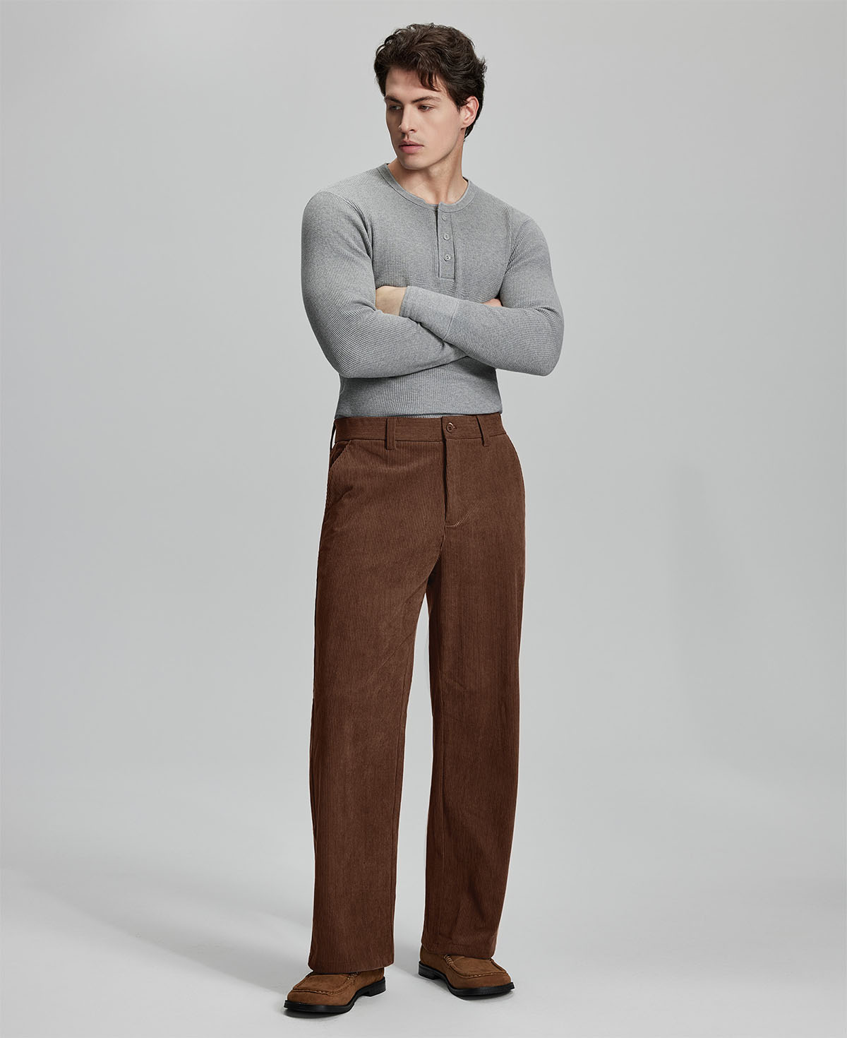 Model in gray sweater with coffee wide-leg corduroy pants, showcasing casual yet neat daily wear styling.