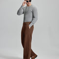 Side view of model wearing sunglasses with coffee wide-leg corduroy pants, highlighting loose fit and style adaptability.