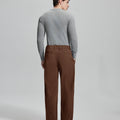 Back view of coffee wide-leg corduroy pants, showing overall silhouette and rear pocket design for comfort and style.