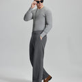 Side view of model wearing sunglasses with dark grey wide-leg corduroy pants, highlighting loose fit and style adaptability.