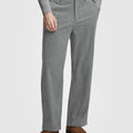 Man in gray knit, light grey Men's Wide Leg Corduroy Dress Casual Pants, and brown loafers, showing texture and drape.