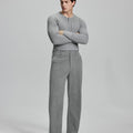 Model in gray sweater with light grey wide-leg corduroy pants, showcasing casual yet neat daily wear styling.