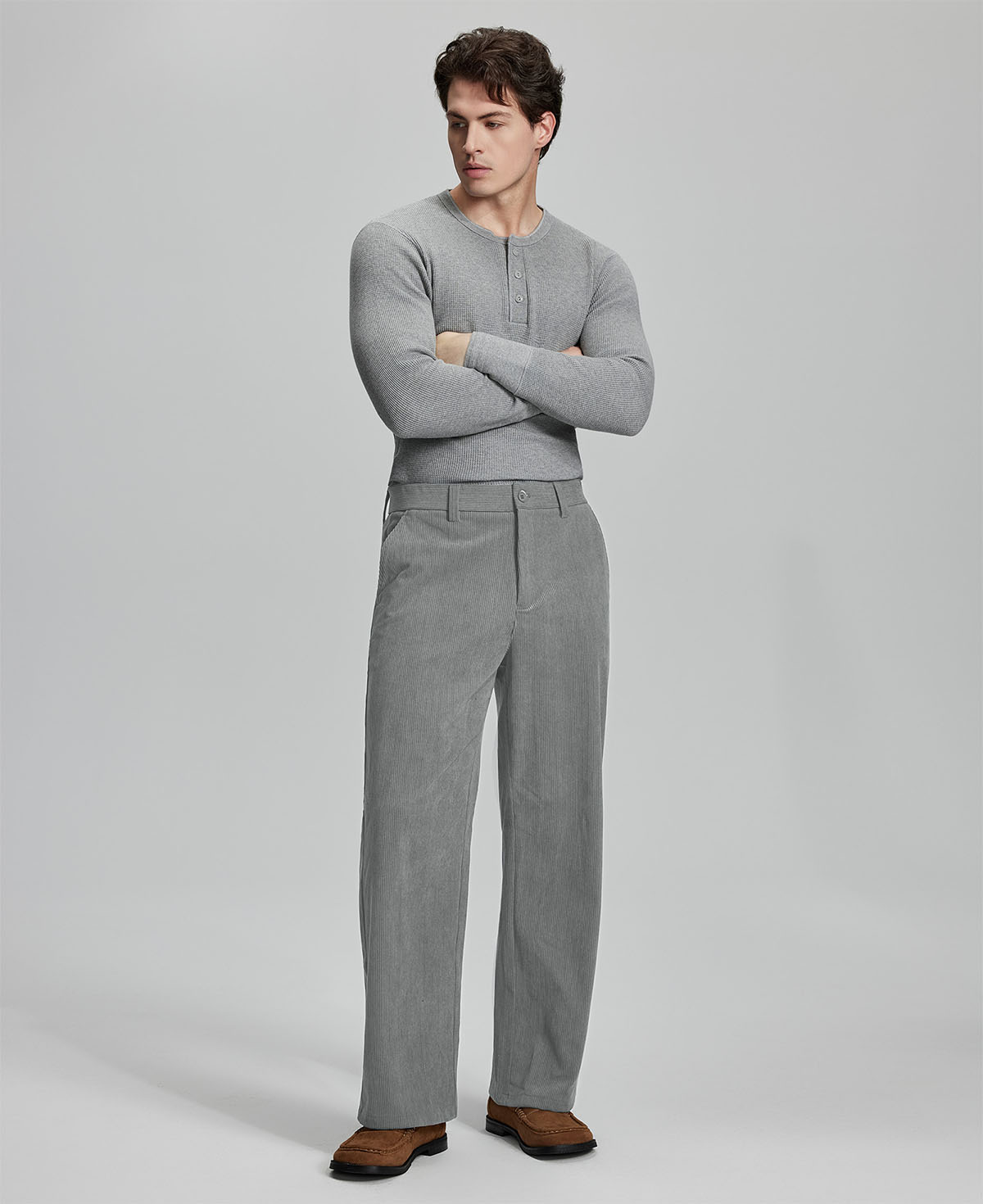 Model in gray sweater with light grey wide-leg corduroy pants, showcasing casual yet neat daily wear styling.