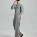Side view of model wearing sunglasses with light grey wide-leg corduroy pants, highlighting loose fit and style adaptability.