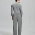 Back view of light grey wide-leg corduroy pants, showing overall silhouette and rear pocket design for comfort and style.