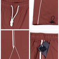 Man in red baggy wide leg sweatpants, showing both side and front views while standing.